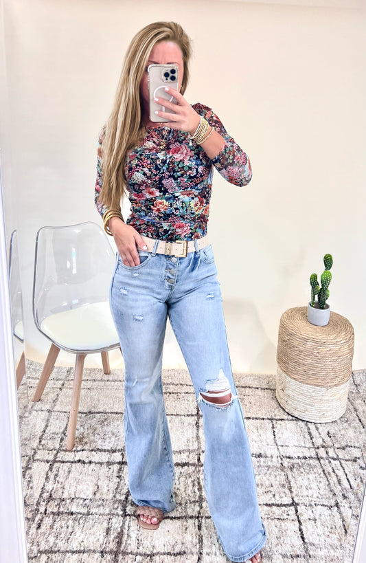 Risen Mid Rise Button Down Flare Jeans