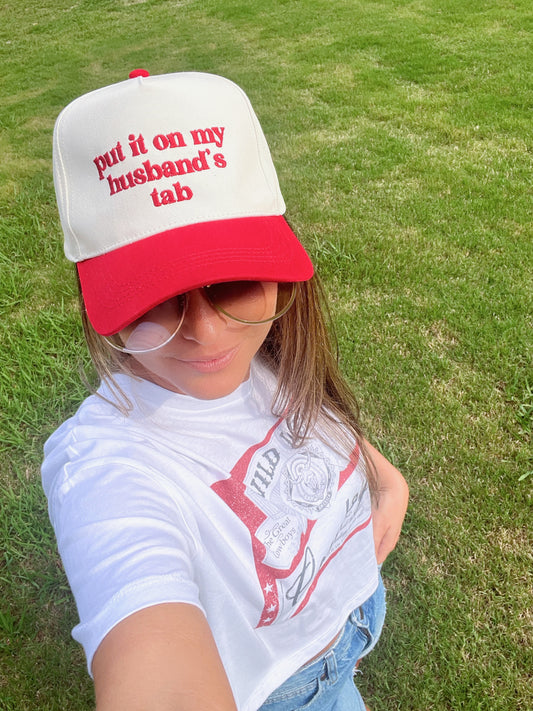 Put It On My Husbands Tab Trucker Hat
