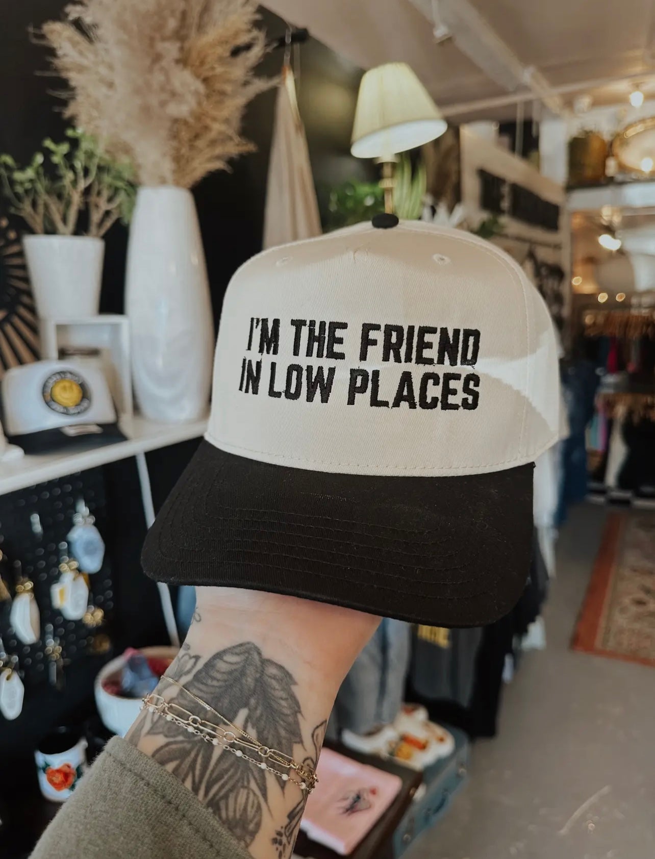 Friend in Low Places Trucker Hat